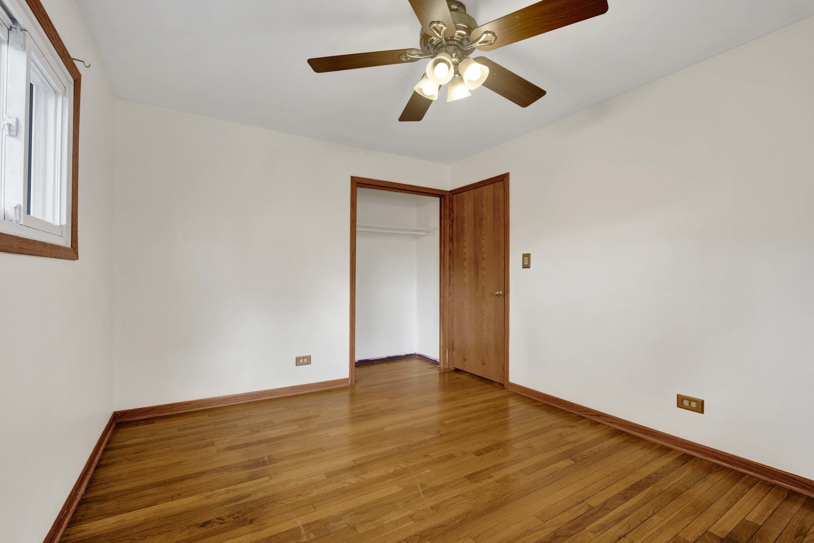 2S224 Valley Road Lombard, IL 60148 - Photo 25 of 37 a view of an empty room with wooden floor