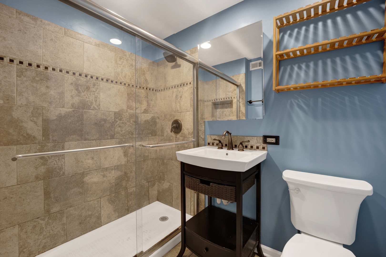 2S224 Valley Road Lombard, IL 60148 - Photo 29 of 37 a bathroom with a sink a toilet and shower