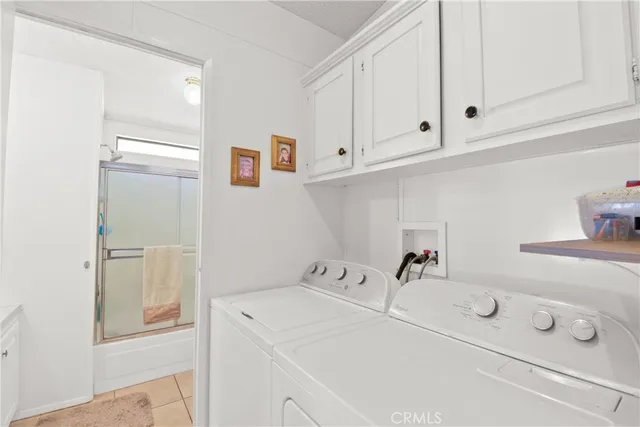 a bathroom with a sink and cabinets