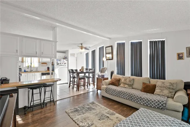 a living room with furniture and a table