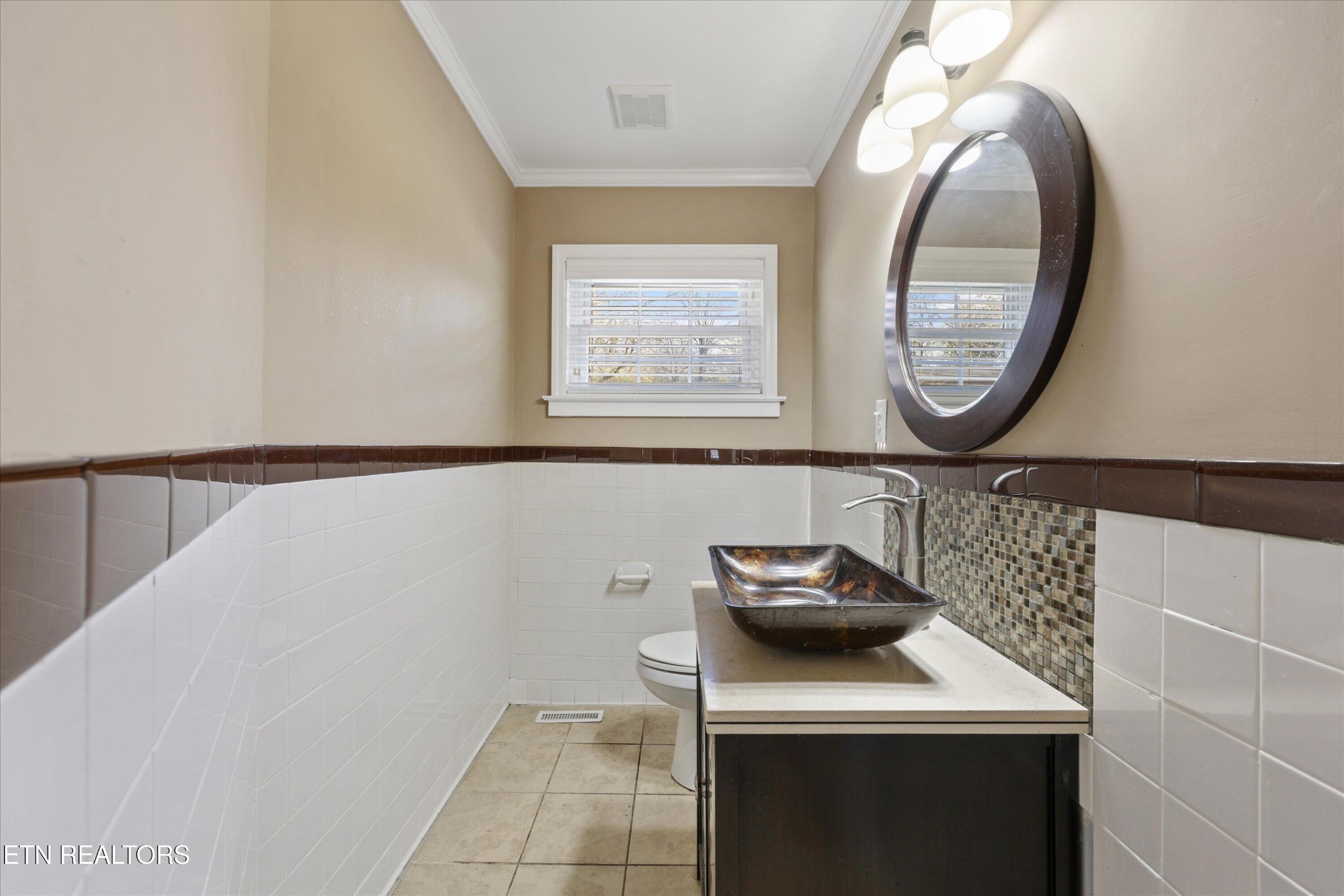 1221 Huntington Road Southwest Knoxville, TN 37919 - Photo 14 of 23 a bathroom with a sink and a mirror