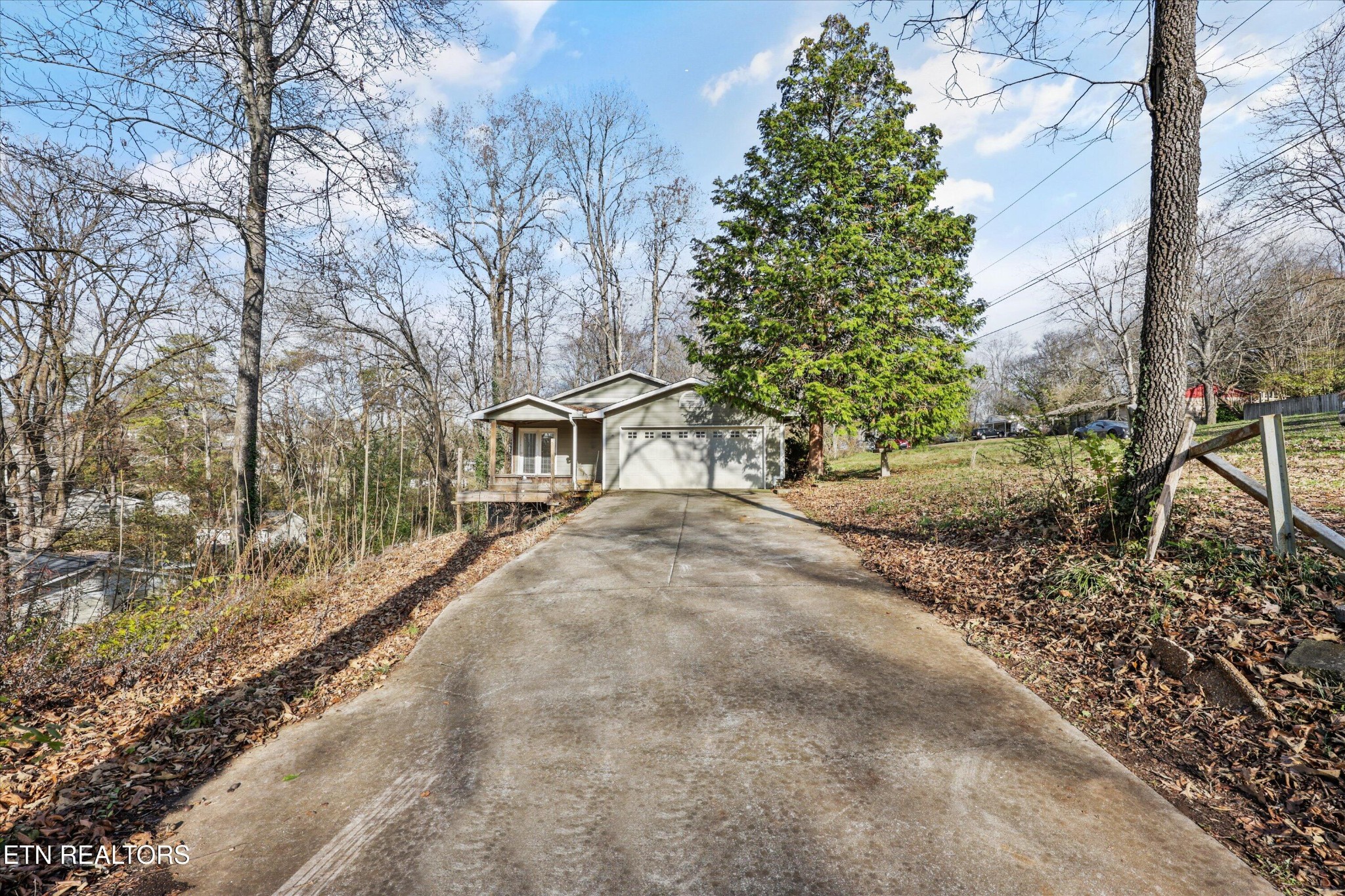1221 Huntington Road Southwest Knoxville, TN 37919 - Photo 22 of 23 a view of a yard with plants and trees