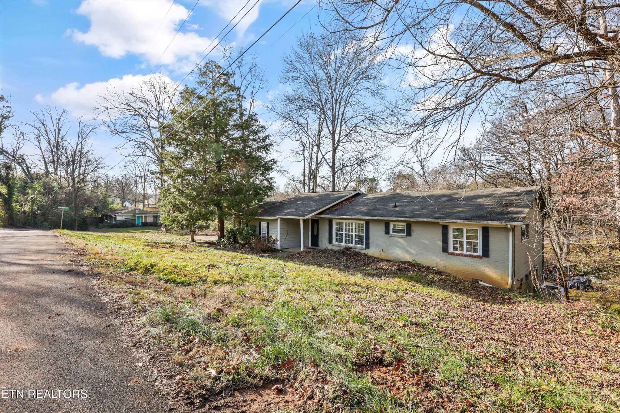 1221 Huntington Road Southwest Knoxville, TN 37919 - Photo 3 of 23 a view of house with outdoor space and garden