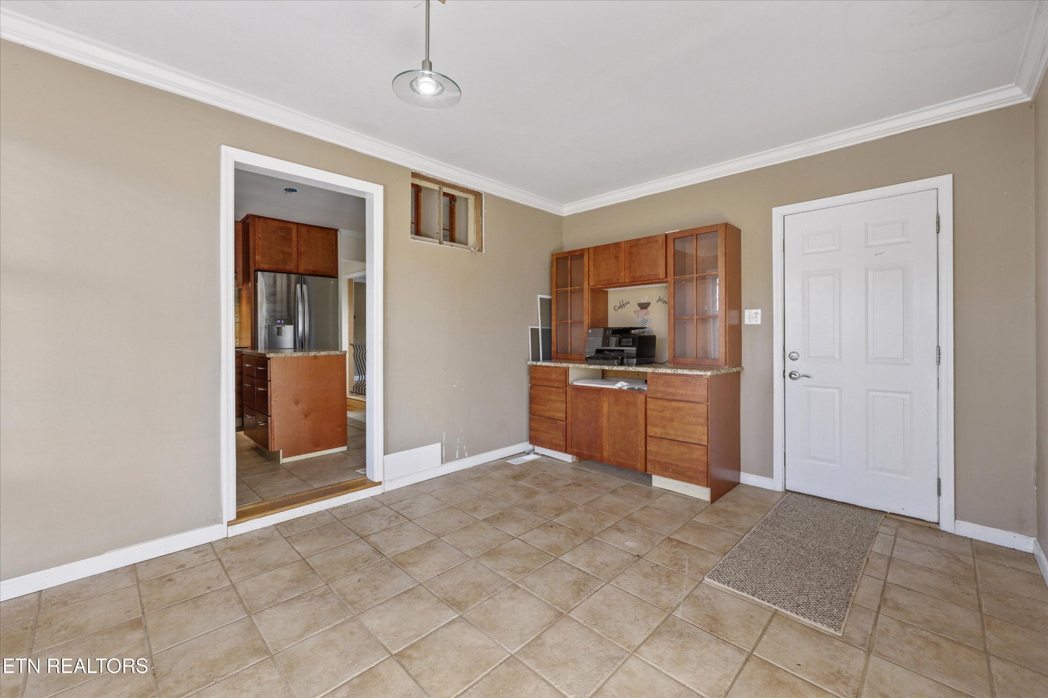 1221 Huntington Road Southwest Knoxville, TN 37919 - Photo 10 of 23 a kitchen with granite countertop a sink and cabinets