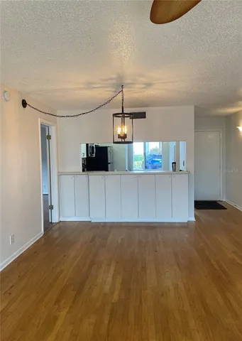 a view of a kitchen with a sink