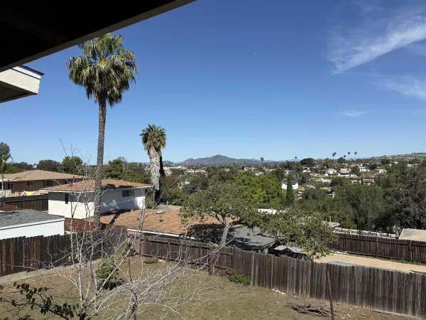 a view of a lake from a balcony