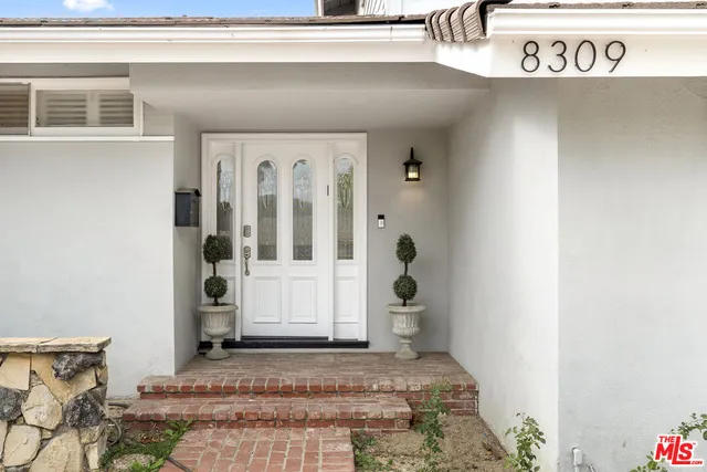 a view of a entryway door of the house