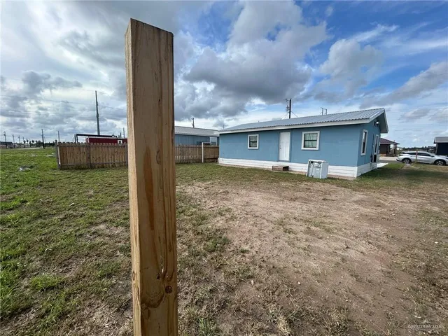 a view of a terrace with yard
