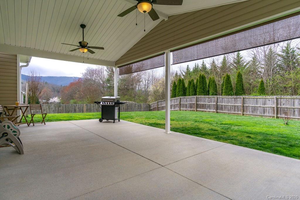 94 Wildbriar Road Fletcher, NC 28732 - Photo 25 of 27 a view of a garden with porch