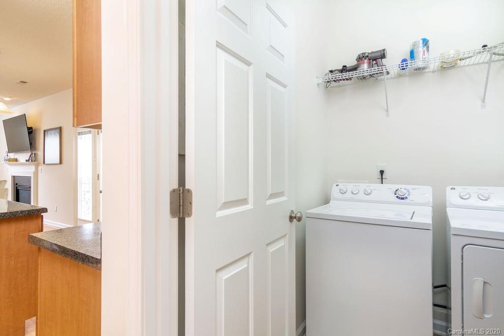 94 Wildbriar Road Fletcher, NC 28732 - Photo 26 of 27 a utility room with dryer and washer