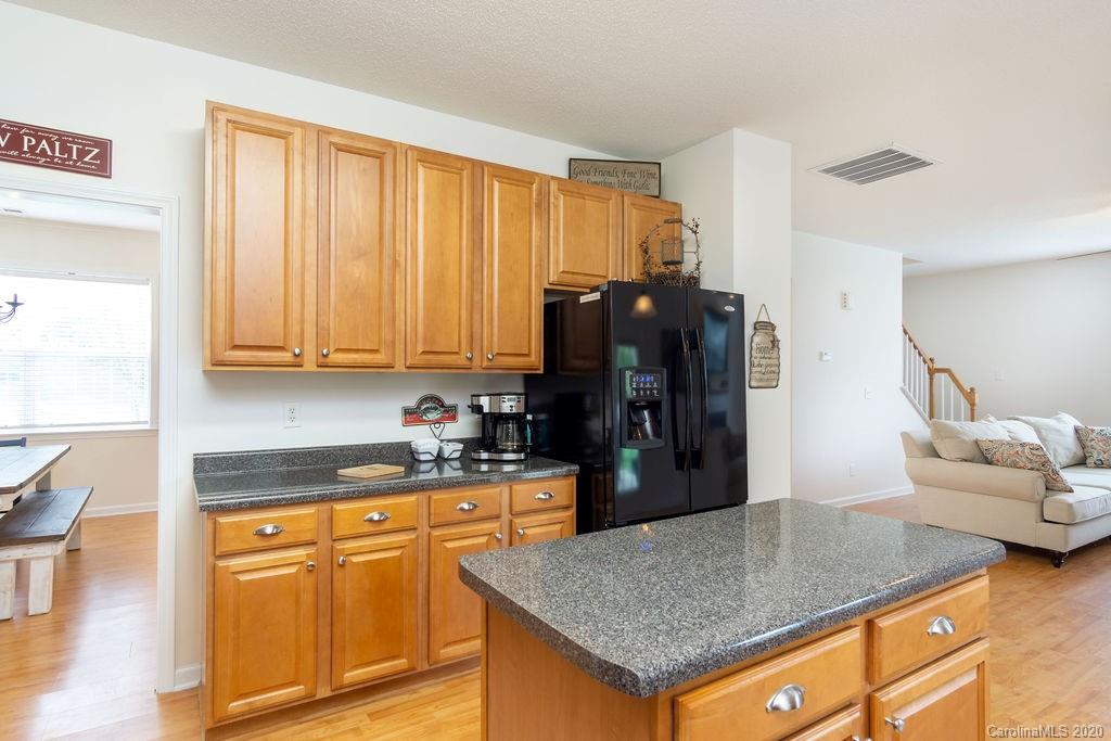 94 Wildbriar Road Fletcher, NC 28732 - Photo 5 of 27 a kitchen with stainless steel appliances granite countertop a granite counter tops and a refrigerator