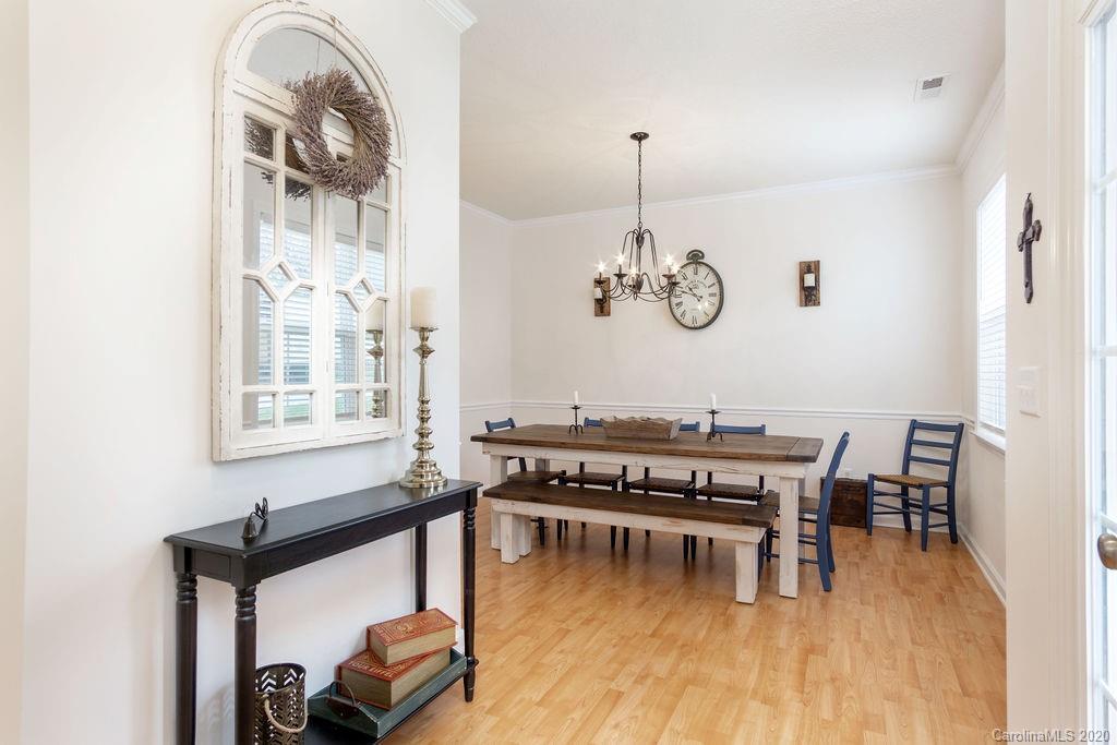 94 Wildbriar Road Fletcher, NC 28732 - Photo 8 of 27 a view of a dining room with furniture window and wooden floor