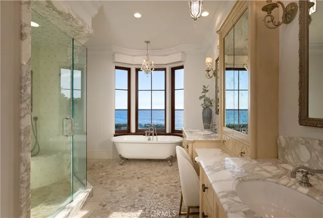 a large bedroom with a large bed and a large window