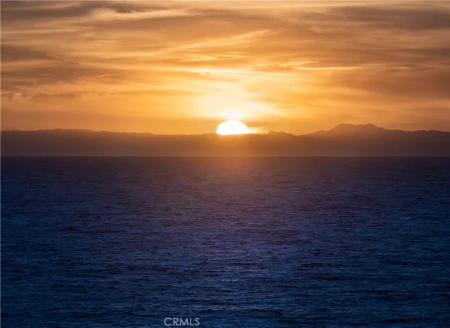 a view of a room with an ocean
