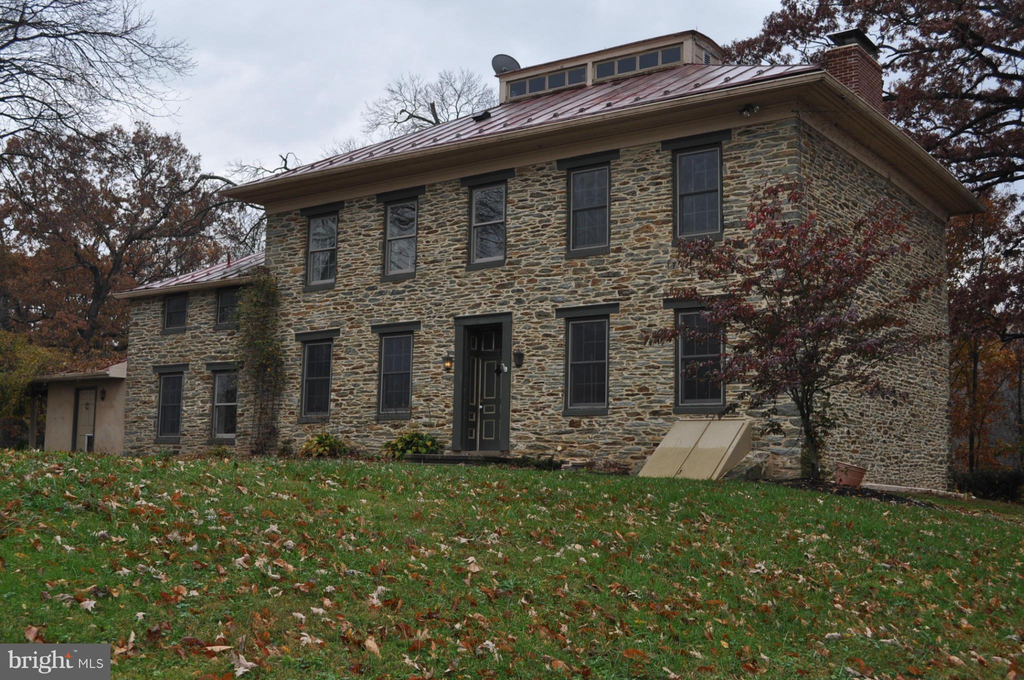 205 Hoff Road Union Bridge, MD 21791 - Photo 2 of 30 a front view of a house with a garden