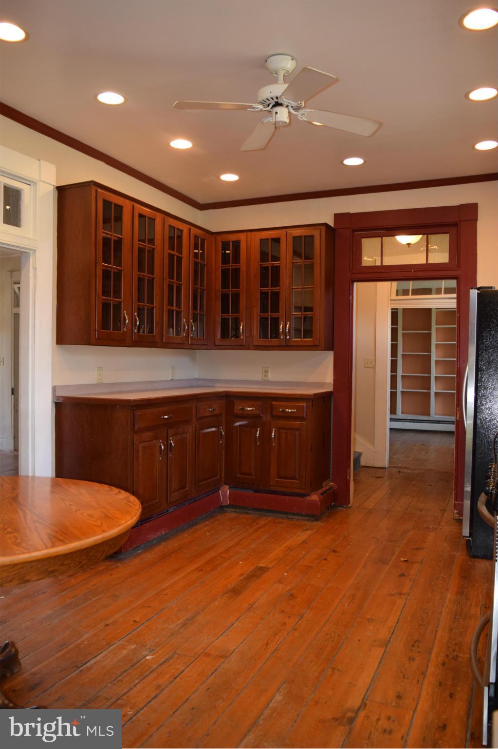 205 Hoff Road Union Bridge, MD 21791 - Photo 14 of 30 a large kitchen with stainless steel appliances granite countertop a sink and a refrigerator
