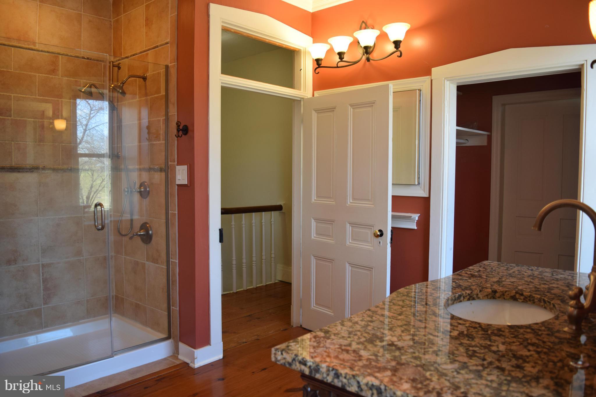 205 Hoff Road Union Bridge, MD 21791 - Photo 16 of 30 a bathroom with a granite countertop shower and a sink