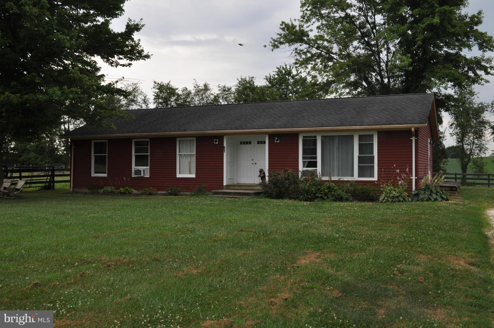 205 Hoff Road Union Bridge, MD 21791 - Photo 20 of 30 a front view of a house with a garden
