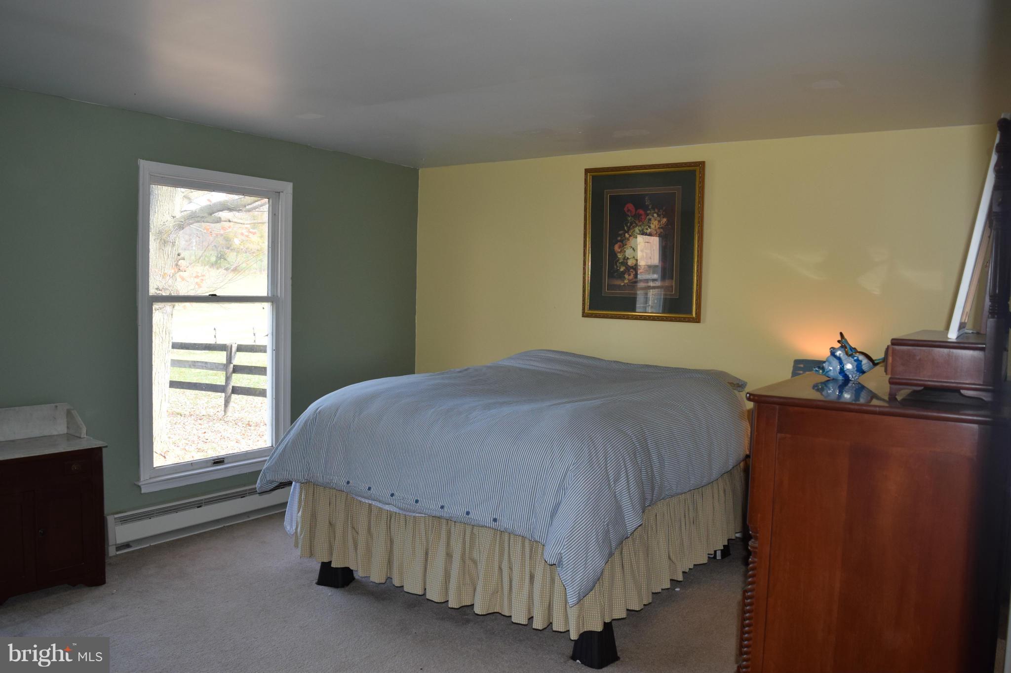 205 Hoff Road Union Bridge, MD 21791 - Photo 22 of 30 a bedroom with a bed and a window