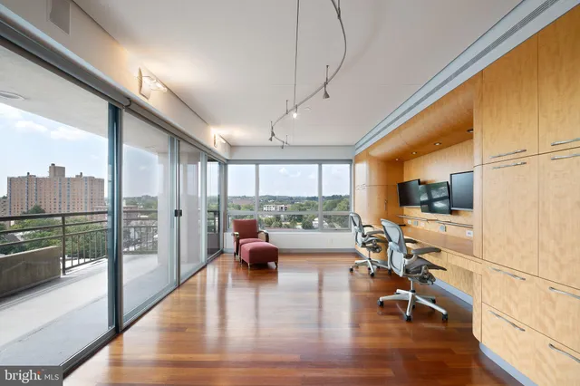 a view of city and roof deck