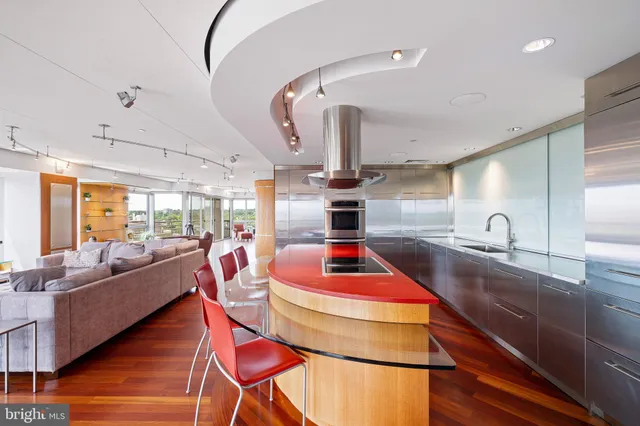 a bathroom with a shower and a glass door