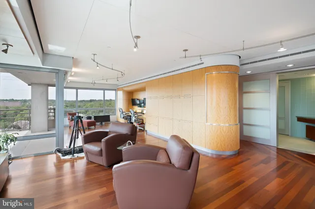 a bathroom with a double vanity and a mirror