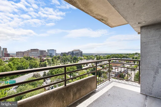 a bathroom with a shower and a sink