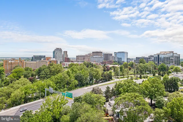 a view of bathroom with a tub and shower