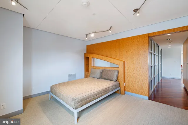 a view of a livingroom with furniture and a chandelier