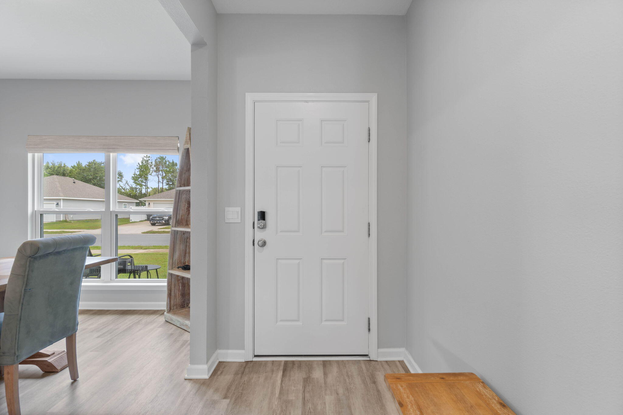 38 Silverthorn Street Freeport, FL 32439 - Photo 8 of 42 a view of room with window and wooden floor