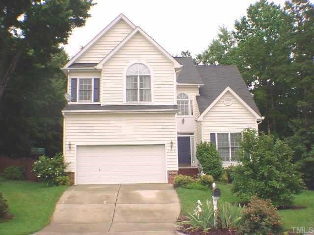 6900 Lamarsh Court Raleigh, NC 27617 - Photo 1 of 1 a front view of a house with a yard and garage