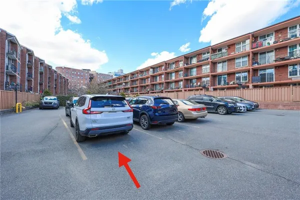 a cars parked in front of a building
