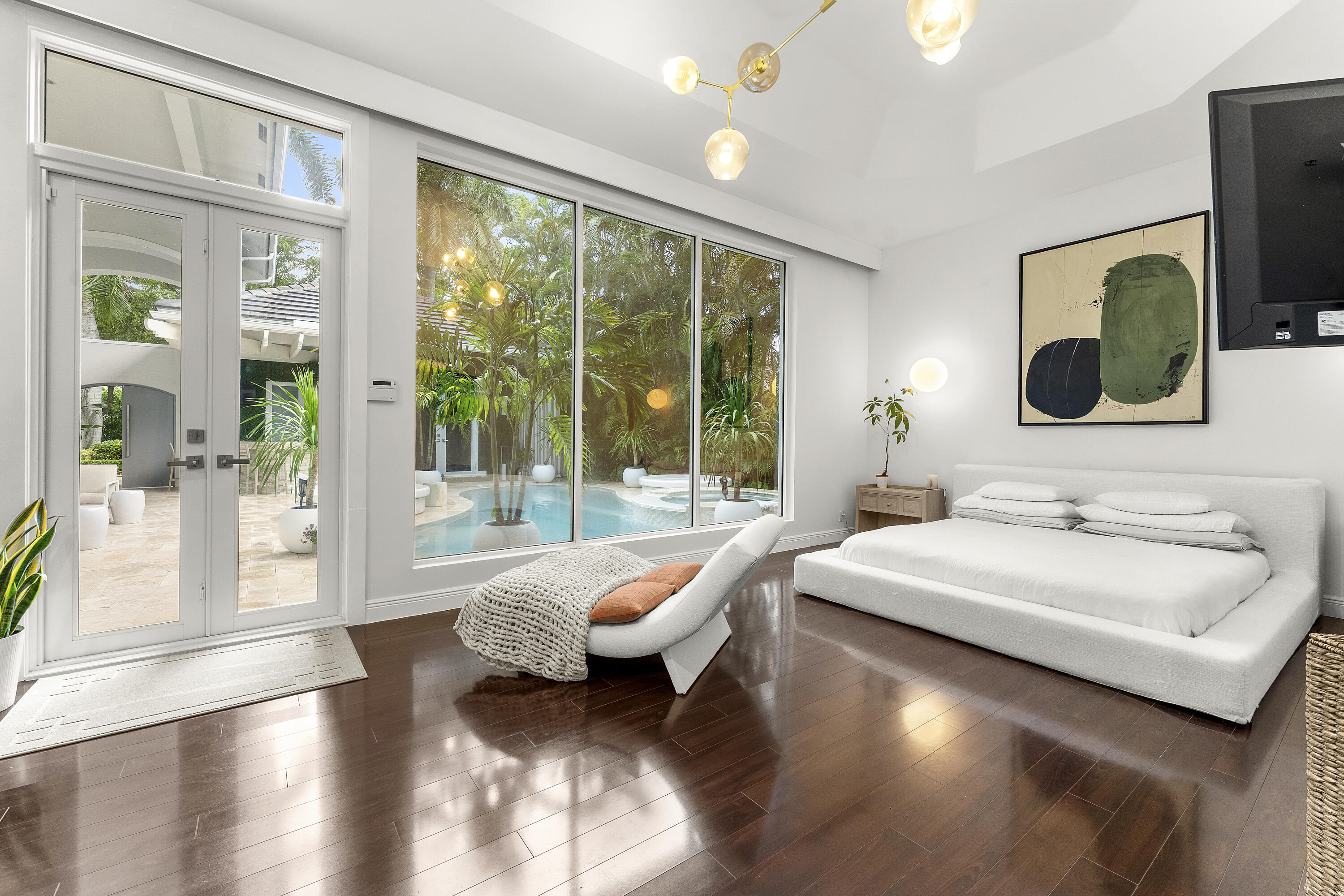 3156 Northwest 61st Street Boca Raton, FL 33496 - Photo 10 of 46 a living room with furniture and a large window