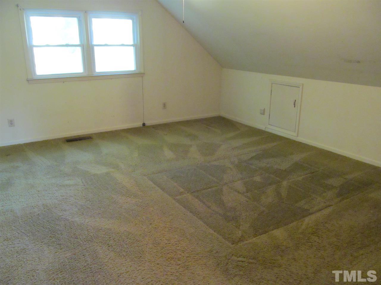 3417 Cheyenne Road Raleigh, NC 27609 - Photo 14 of 25 an empty room with a windows