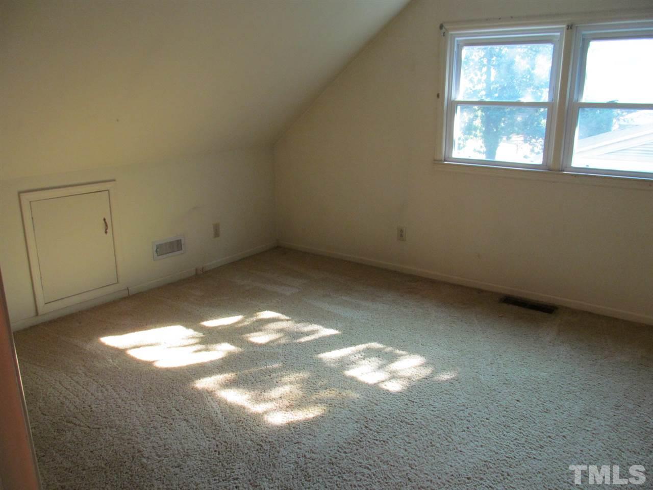 3417 Cheyenne Road Raleigh, NC 27609 - Photo 16 of 25 an empty room with windows