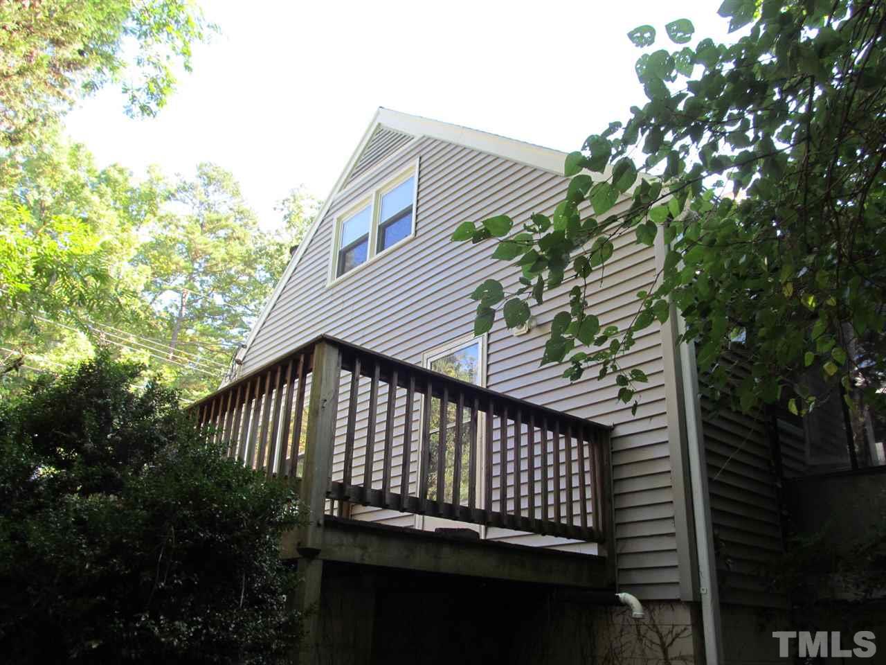 3417 Cheyenne Road Raleigh, NC 27609 - Photo 3 of 25 a view of a roof deck with wooden floor and fence