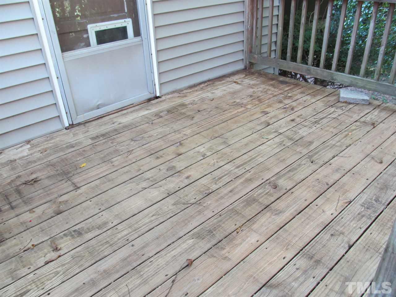 3417 Cheyenne Road Raleigh, NC 27609 - Photo 23 of 25 a view of a house with a wooden deck