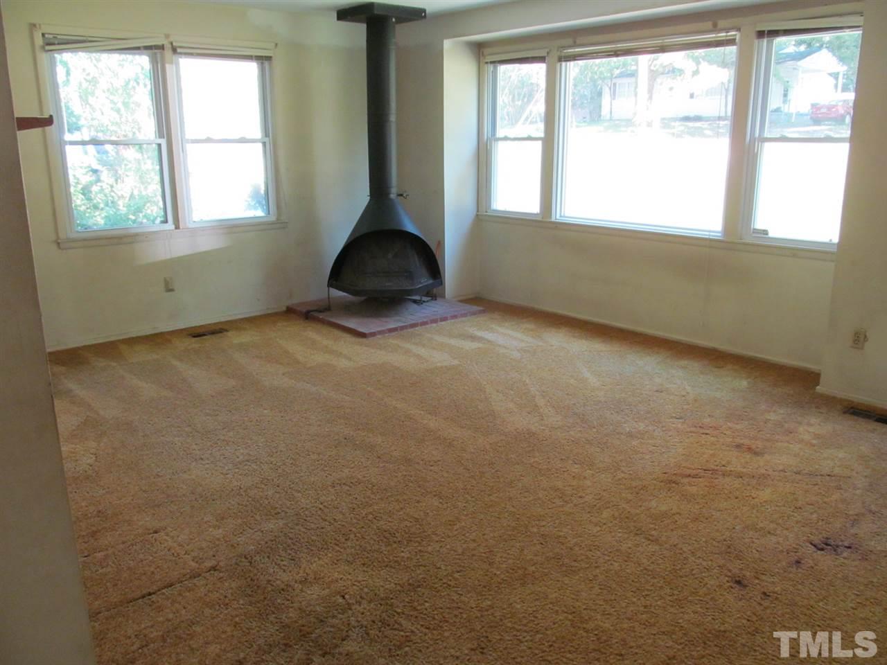 3417 Cheyenne Road Raleigh, NC 27609 - Photo 4 of 25 an empty room with a window