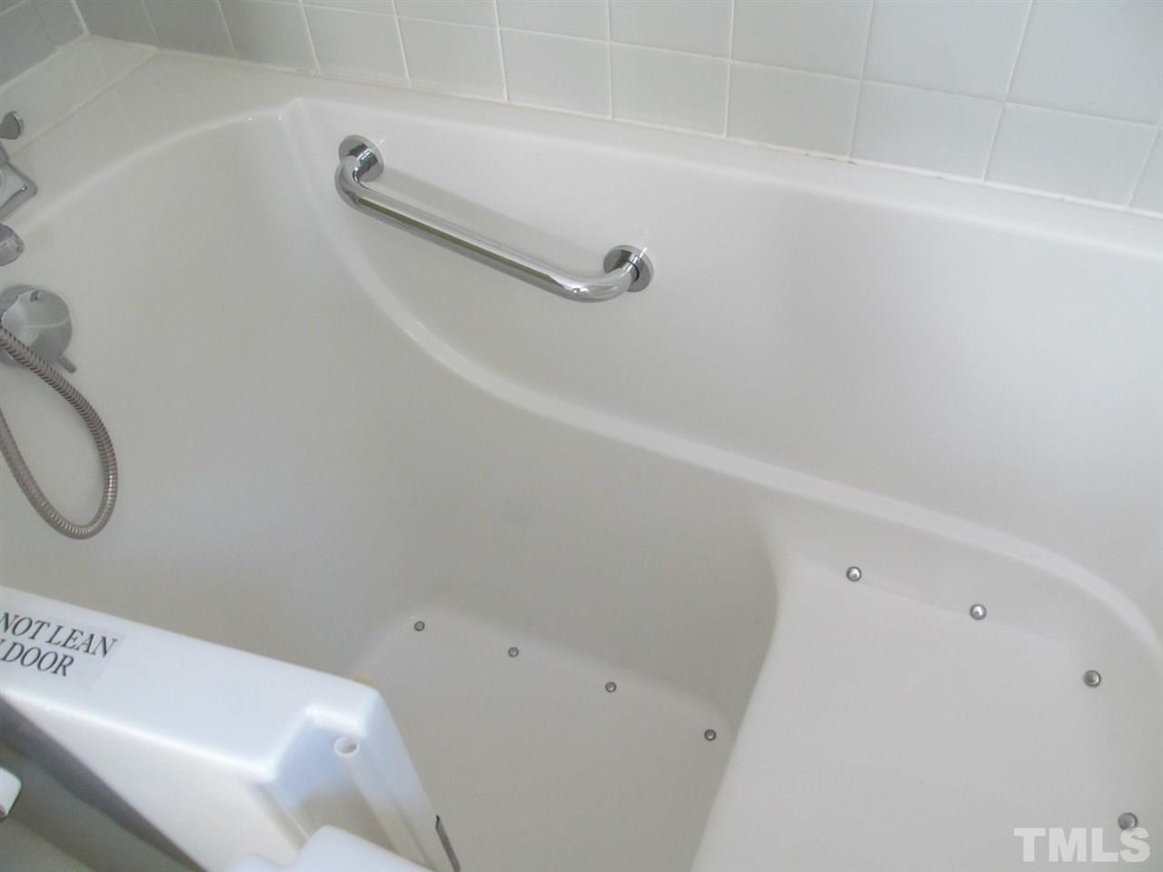 3417 Cheyenne Road Raleigh, NC 27609 - Photo 9 of 25 a view of a bathtub