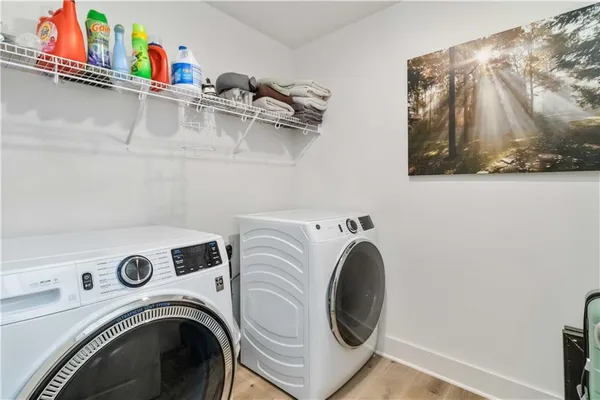 a utility room with dryer and washer