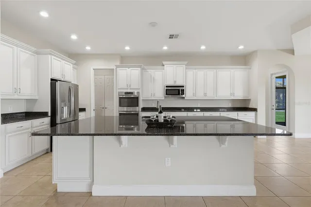 a view of a kitchen with a sink