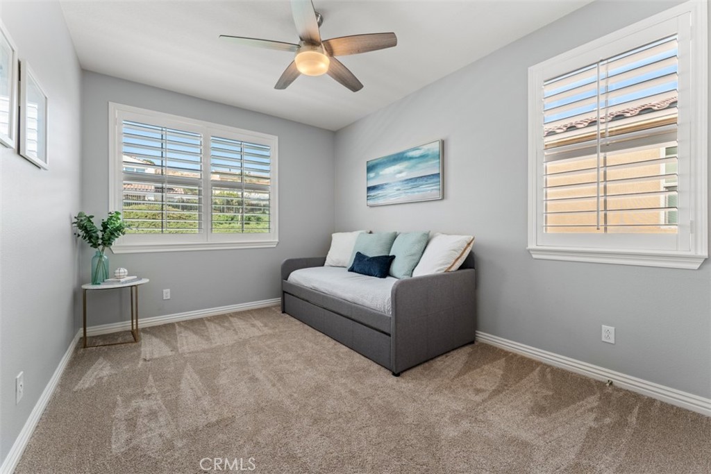 23 Vivido Street Rancho Mission Viejo, CA 92694 - Photo 18 of 44 a living room with furniture and a window