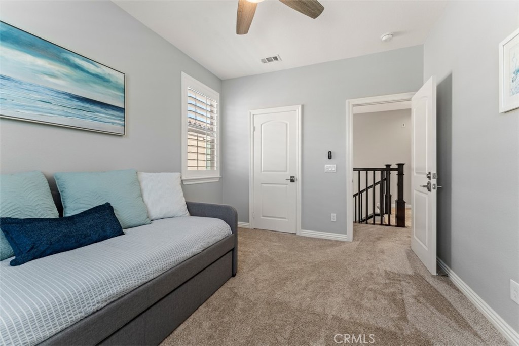 23 Vivido Street Rancho Mission Viejo, CA 92694 - Photo 19 of 44 a living room with furniture and a ceiling fan