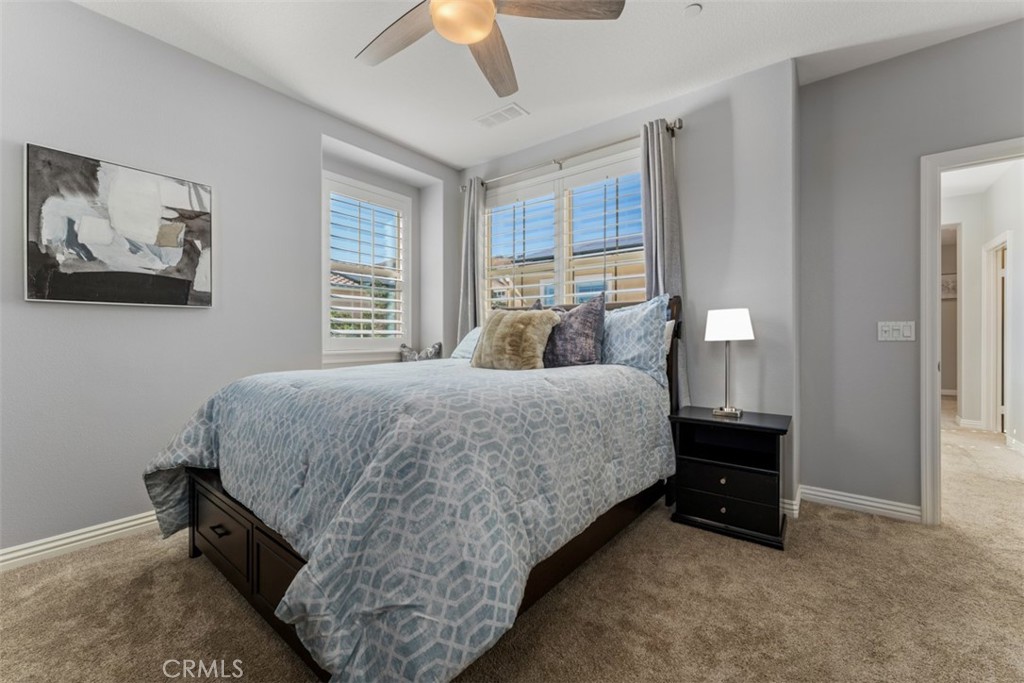23 Vivido Street Rancho Mission Viejo, CA 92694 - Photo 22 of 44 a bedroom with a bed and window