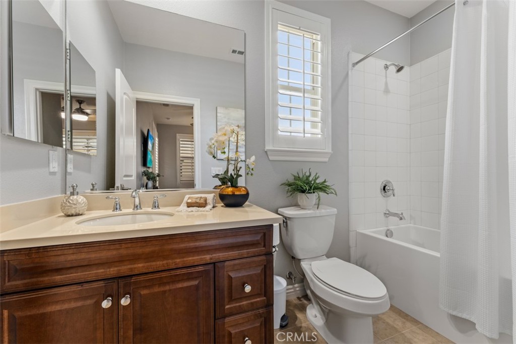 23 Vivido Street Rancho Mission Viejo, CA 92694 - Photo 27 of 44 a bathroom with a sink a toilet and shower