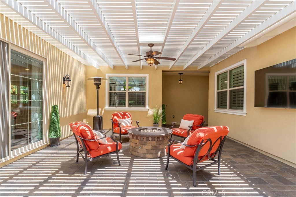 23 Vivido Street Rancho Mission Viejo, CA 92694 - Photo 29 of 44 a outdoor space with patio furniture and wooden floor