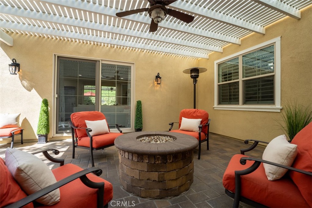 23 Vivido Street Rancho Mission Viejo, CA 92694 - Photo 30 of 44 a outdoor space with patio couches and a potted plant
