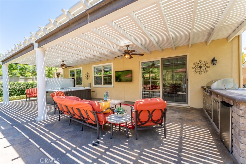 23 Vivido Street Rancho Mission Viejo, CA 92694 - Photo 31 of 44 a balcony with furniture and wooden floor