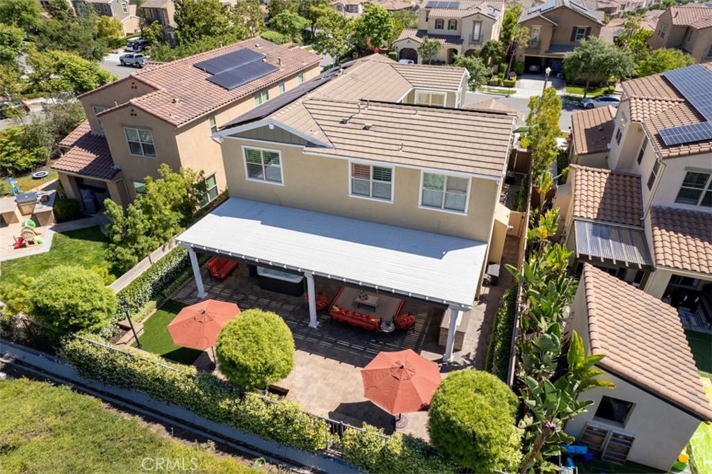 23 Vivido Street Rancho Mission Viejo, CA 92694 - Photo 4 of 44 an aerial view of a house with a yard and sitting area