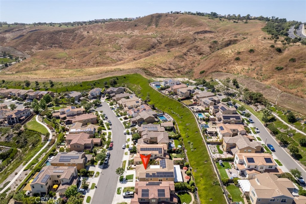 23 Vivido Street Rancho Mission Viejo, CA 92694 - Photo 7 of 44 an aerial view of residential houses with outdoor space